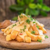 Cheese Fries · Yummy french fries topped with melted cheese.