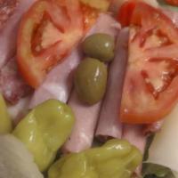 Antipasto Salad · Tomato, pepperoni, marinated vegetables, provolone cheese, mozzarella, ham, and salami.