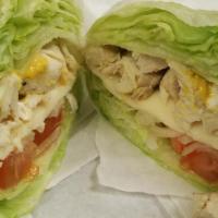 Grilled Chicken Wrap · Lettuce, grilled chicken, onions,and tomatoes.