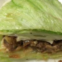 Philly Steak Wrap · Lettuce, steak, cheese, and onions.