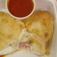 Calzone Cheese · Pizza Dough rolled as a Sandwich filled with Ricotta and Mozzarella Cheese . Sauce on side.
