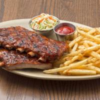 Louis Ribs · A larger, meatier cut of pork rib with more natural marbling. Finished your choice of sauce....