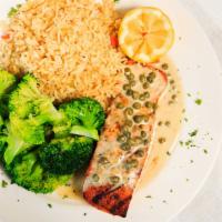 Shrimp & Salmon Piccata · Grilled salmon, topped with shrimp in a lemon caper wine sauce, rice, garlic seared green be...
