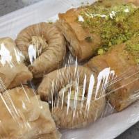 Assorted Medium Sheet 1 · Shredded wheat dough rolled in crushed pistachio.
 Tray size available: medium.
Tray 8