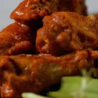 Rocks Wings · Crispy mix of traditional jumbo drums and wings. Served with celery and chips.