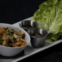 Chicken Lettuce Wraps · Sauteed chicken, mushrooms, and water chestnuts with sweet hoisin sauce. Accompanied with sp...