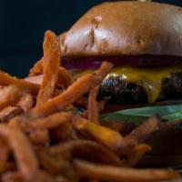 Rocks Burger · 8oz certified Angus beef patty, lettuce, tomatoes, onions, choice of melted cheese, and Thou...