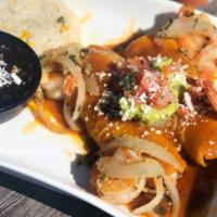 Surf-Turf Enchiladas · Shrimp and steak, chipotle tomatillo sauce, pico de gallo, Jack cheese, guacamole.