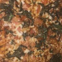 Spaceship Margherita Pizza · Margherita pizza with fresh mozzarella and basil