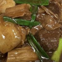 Beef Stew W/ Dried Scallops Clay Pot 瑶柱牛腩煲 · 