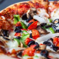 Veggie Delight Specialty Pizza · Mushrooms, onions, green peppers, tomatoes and black olives.