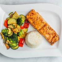 Grilled Salmon · Served with vegetables and potatoes.