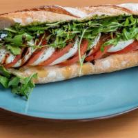 Less Is More Sandwich · Vegetarian. A.K.A. Caprese - An Italian classic. Baguette bread, fresh mozzarella cheese, to...