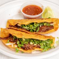 Taco De Birria · Spicy shredded beef in fried corn tortilla.
Dorado a la plancha.cilantro ,onion,and salsa