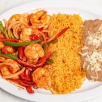 Camarones Rancheros · Shrimp cooked with onions, tomatoes, bell peppers, jalapeños, and ranchero salsa. Served wit...