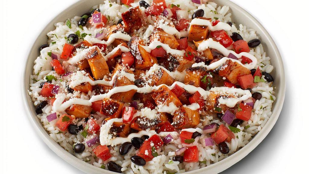 Cholula® Hot & Sweet Chicken Bowl · Cholula® Hot & Sweet Chicken made with Cholula® Original Hot Sauce and real honey paired with pico de gallo, cilantro lime rice, black beans, sour cream, and cotija cheese. [Cal 590]. For additional ingredients or substitutions, please order a Create Your Own Entree.