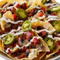 Create Your Own 3-Cheese Nachos · Freshly made tortilla chips topped with queso, protein, flavorful salsas, sauces, and toppin...