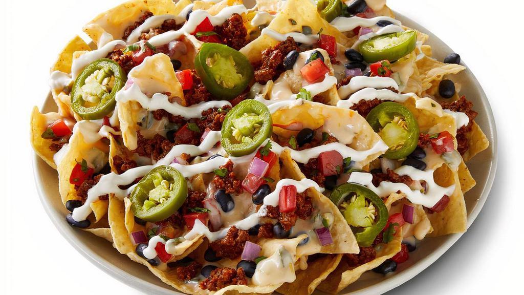 Create Your Own 3-Cheese Nachos · Freshly made tortilla chips topped with queso, protein, flavorful salsas, sauces, and toppings. Chips served on the side to keep them crispy. Top it with with guacamole at no extra cost. [Cal 730-750]