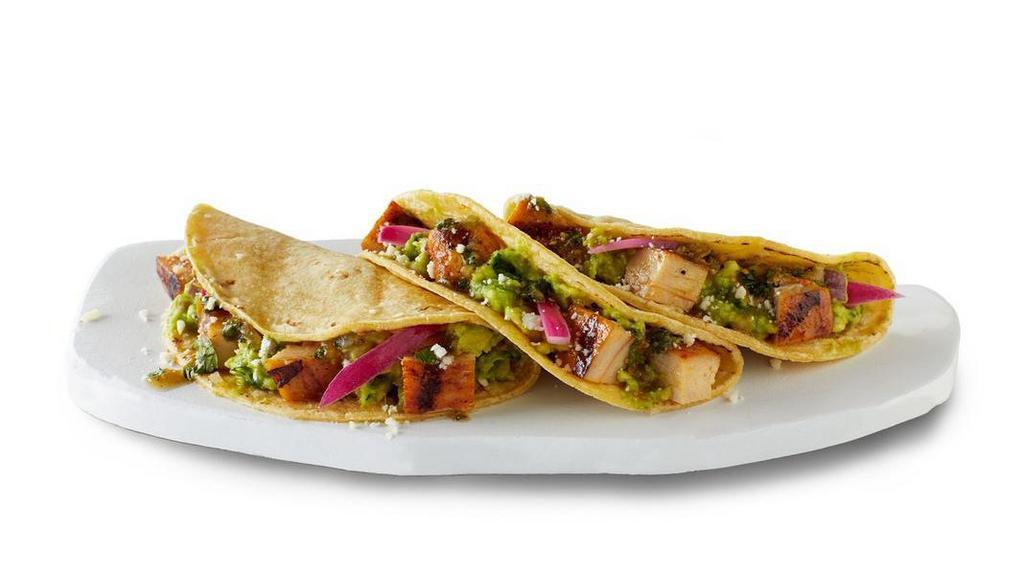 Street Style Chicken Tacos · Grilled adobo chicken in soft corn tortillas topped with hand-crafted guac, salsa verde, pickled red onion and cotija cheese. Served with 3 tacos. [Cal 490-540]. For additional ingredients or substitutions, please order a Create Your Own Entree.