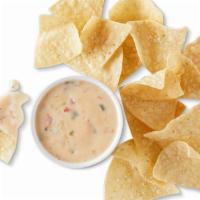 3-Cheese Queso & Chips · Our signature 3-Cheese Queso, served with freshly fried tortilla chips seasoned with salt an...