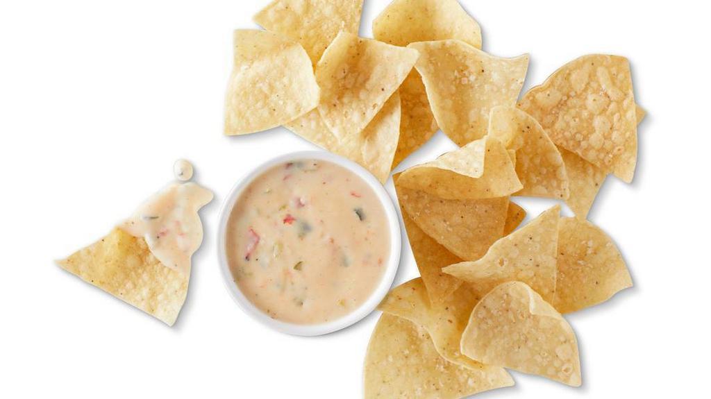 3-Cheese Queso & Chips · Our signature 3-Cheese Queso, served with freshly fried tortilla chips seasoned with salt and lime. [Cal 940]