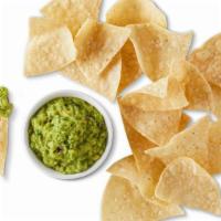Hand-Crafted Guacamole & Chips · Hand-crafted guacamole made-in-house daily, served with freshly fried tortilla chips seasone...
