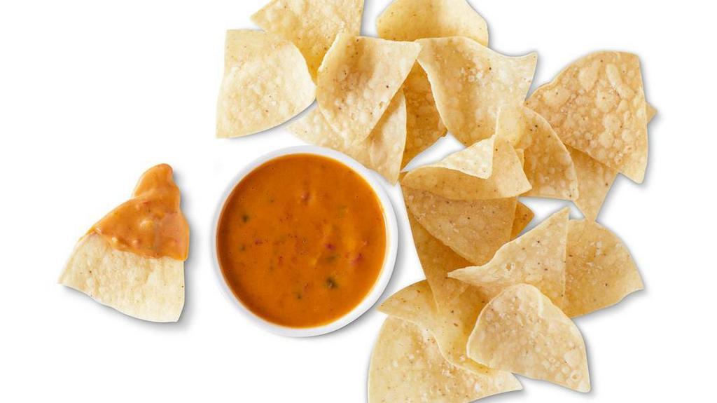 Queso Diablo & Chips · Our spicy signature Queso Diablo, served with freshly fried tortilla chips seasoned with salt and lime. Spice level 3/4. [Cal 940]