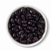 Side Of Black Beans · Black beans cooked in-house daily with cumin and red onion, seasoned with lime juice and sal...