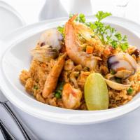 Arroz Del Pacifico Sur (Peruvian Style Paella) · Gluten free. Infused rice in Peruvian peppers sauce with calamari, mussel, and shrimp garnis...