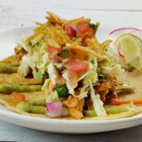 Young Jackfruit Taco · Vegan.  Young jackfruit, pico de gallo, tortilla strips, pico de gallo, avocado crema