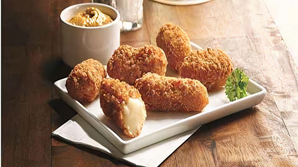 Cheese Curd Beer Pretzel Breaded 15Pc · (NEW ITEM)
THE CLASSIC COMBINATION OF BEER AND PRETZELS WRAPPED AROUND A WISCONSIN CHEDDAR CHEESE CURD IS PERFECT FOR SERVING ALONE OR WITH A VARIETY OF SIGNATURE DIPPING SAUCES