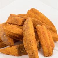 Potatoes Wedges (6) · Seasoned Potato Wedges are thick cut and coated in a pepper seasoned batter
which provides a...