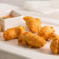 Chicken Flitters 10 Pcs · (NEW ITEM ) 
Crispy Gluten FREE