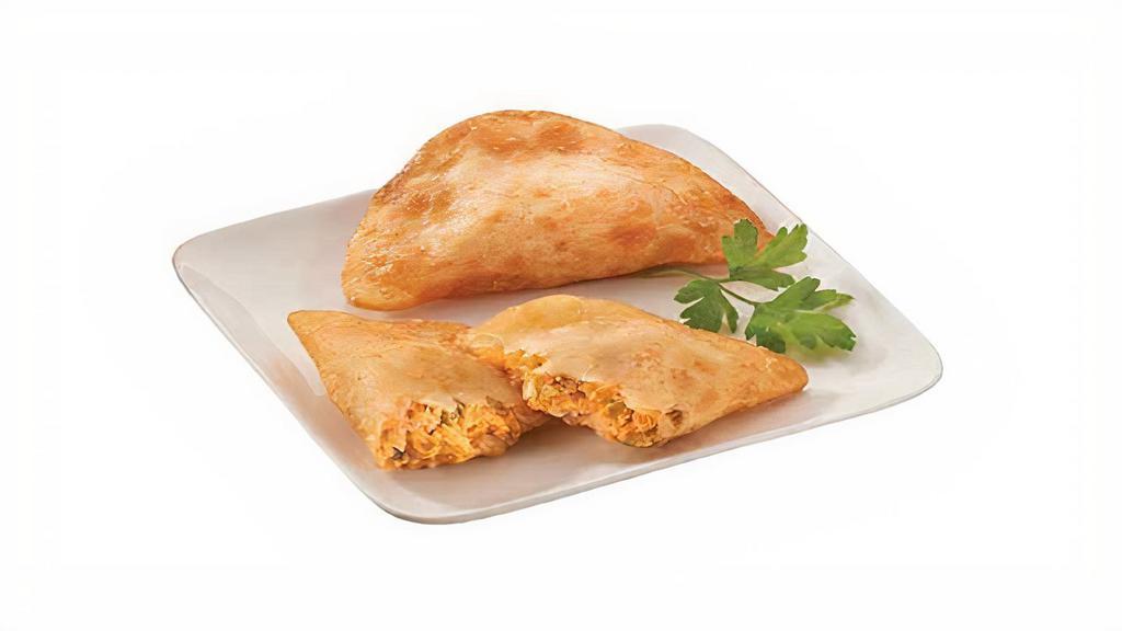 Empanada Buffalo Style Chicken 3 Pcs            · (NEW ITEM)
A UNIQUELY DIFFERENT APPETIZER/HORS D'OEUVRE. A THIN, CRISP WONTON-STYLE DOUGH EXTERIOR FILLED WITH A MILDLY SPICY BUFFALO-STYLE CHICKEN MIXTURE OF CHICKEN BREAST WITH RIB MEAT, LEMON, CAYENNE, BLEU CHEESE, PEPPER SAUCE, CREAM CHEESE, CELERY AND SEASONINGS.
