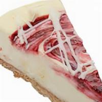 White Chocolate Raspberry Cheesecake · Cream cheese and white chocolate flavored cheesecake, swirled with raspberry puree and finis...