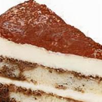 Cheesecake And Dessert Tiramisu · Two layers of sponge cake soaked in tiramisu flavored sauce are layered with cream and masca...