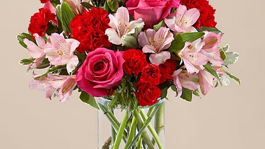 You'Re Precious Bouquet · Blushing shades of pink blooms are nestled in lush greens to charm anyone's day. This bouquet is abundant with a classic assortment of pretty florals – roses, alstroemeria and carnations to name a few. Vase included. Please Note: The bouquet pictured reflects our original design for this product. While we always try to follow the color palette, we may replace stems to deliver the freshest bouquet possible. Item # YPBS