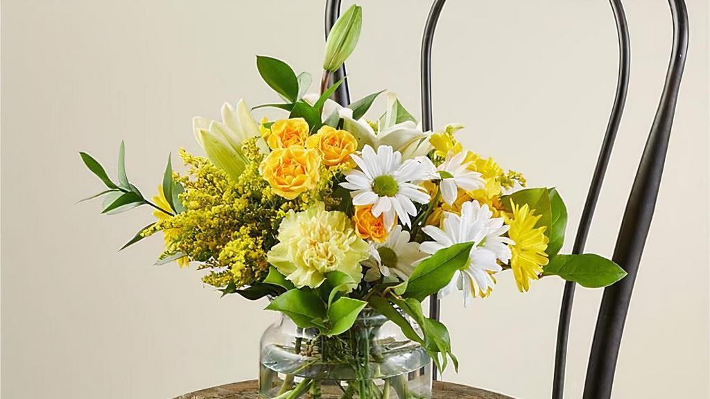 Lemonade · Send the Lemonade Bouquet to celebrate mom on her special day, spring and summer birthdays, or to cheer up a loved one's day. Bright stems like carnations, daisies and roses bloom in joyful, energetic yellows like everyone's favorite citrus refresher. Vase included. Please Note: The bouquet pictured reflects our original design for this product. While we always try to follow the color palette, we may replace stems to deliver the freshest bouquet possible. Item #M5S