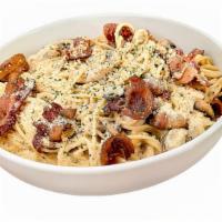 Cream Pasta · Our signature cream sauce paired with spaghetti, parmesan cheese, mushrooms, onions, bacon, ...