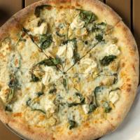 Ulbricht Pizza · Olive oil and garlic base, mozzarella, ricotta cheese, spinach and marinated artichoke hearts.
