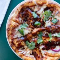 2 Bbq Chicken Pizzas · Grilled chicken breast, red onion, cilantro, house bbq sauce, mozzarella, and tomato sauce.