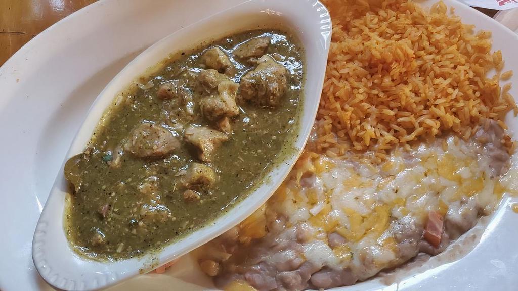 Chile Verde · Chunks of pork meat simmered in our green tomatillo sauce. Served with rice and beans.