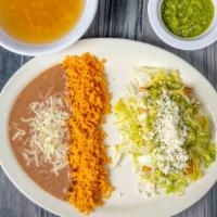Flautas Combination · Flautas with rice and beans
