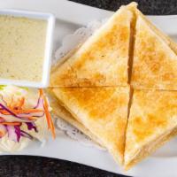 Roti · Asian pita bread served with curry purée sauce.
