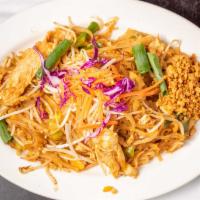 Pad Thai · Rice noodles, egg, scallion, bean sprouts and crushed peanuts.