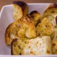 Garlic Bread With Mozzarella · Ciabatta bread with garlic butter and Mozzarella cheese.