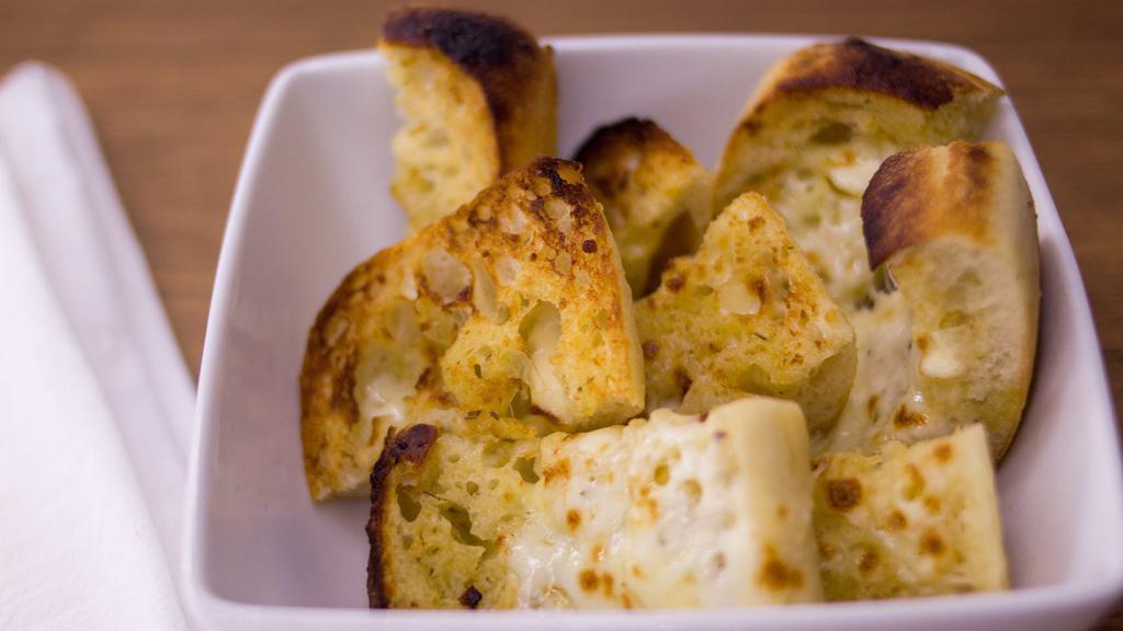 Garlic Bread With Mozzarella · Ciabatta bread with garlic butter and Mozzarella cheese.