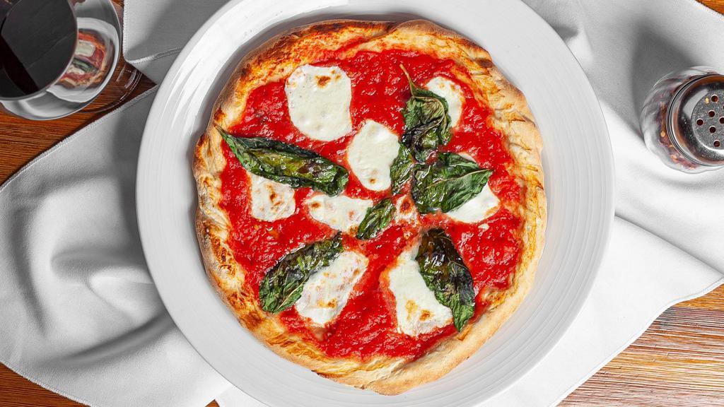 Margherita Napolitano Pizza · All the ingredients come from naples italy. special flour sam marzano tomatoes buffalo mozzarella olive oil sea salt and fresh basil. a true artisan pizza. please no changes or additions to this pizza it is made to the standards of a true napolitano pizza.
