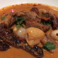 Roasted Duck Curry · In red curry broth, lychee, grape tomatoes, and Thai basil.