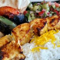 Chicken Breast Kebab · Marinated chunks of chicken breast. Served with basmati rice, grilled tomato and jalapeño, p...